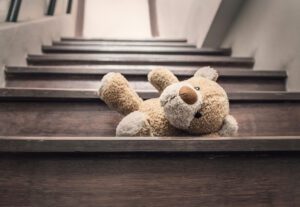 Teddy bear cluttering stair